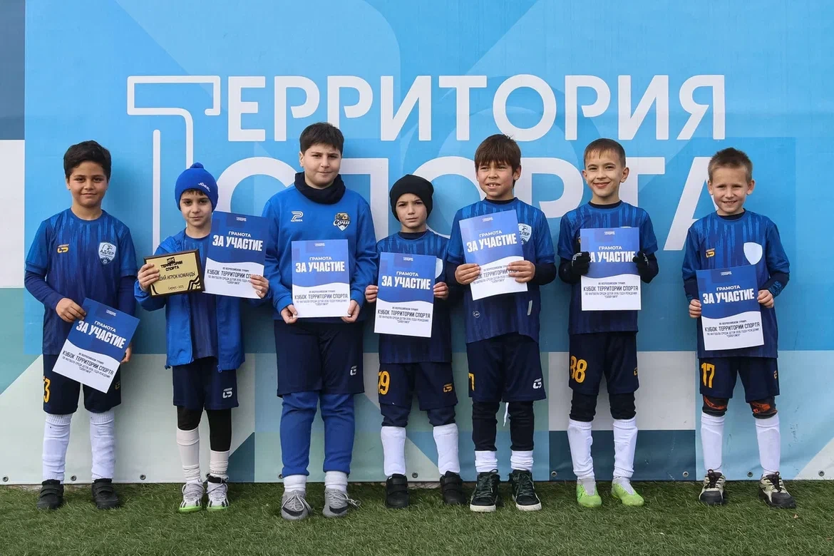 Youth football team in action during a match.