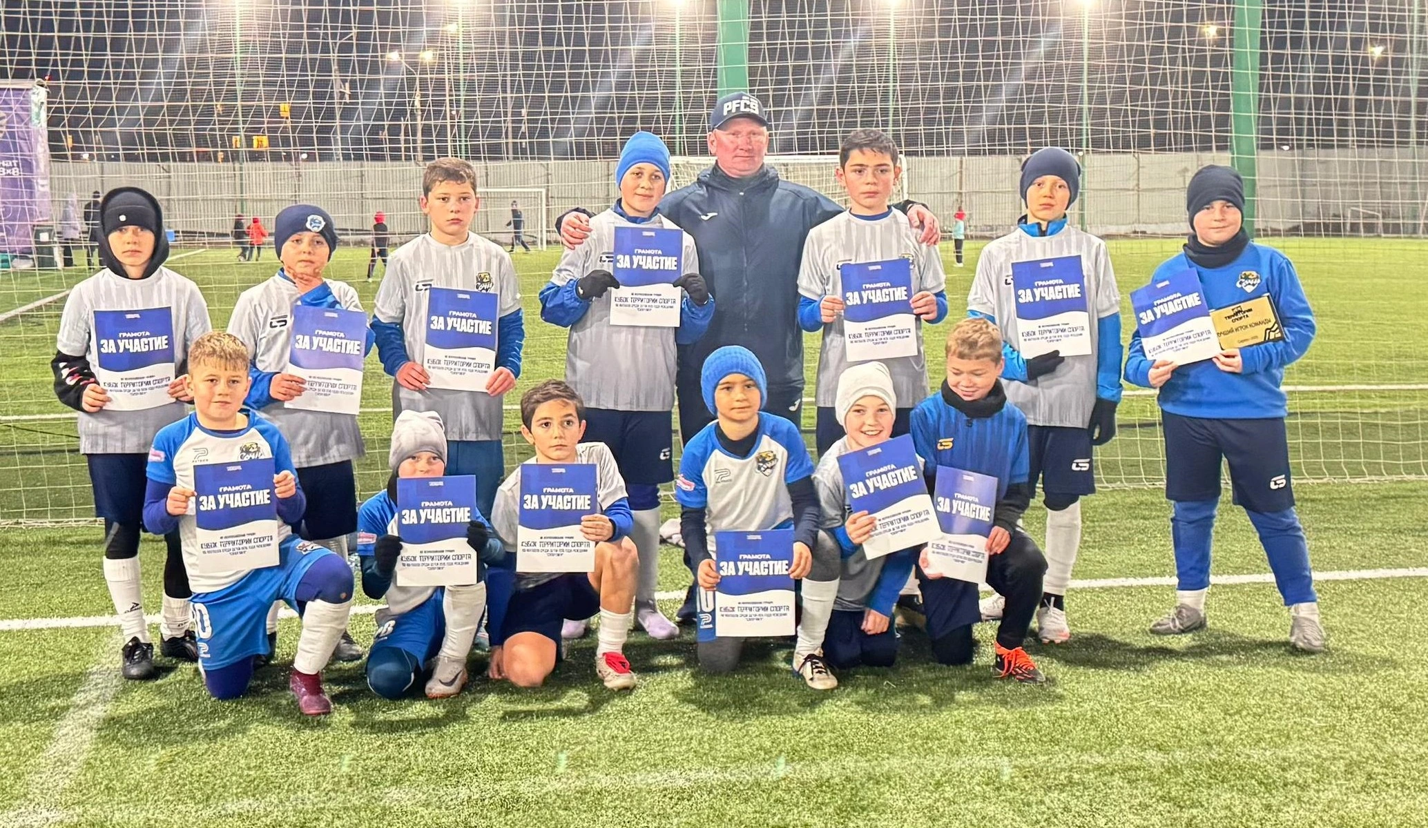 Teenage football players in a competitive match.